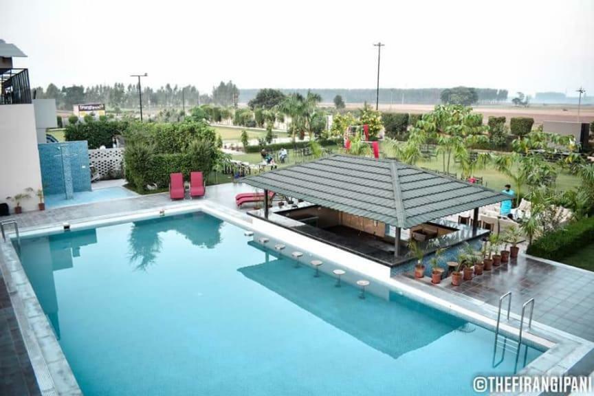 The Firangipani Country Resort Rājpura Eksteriør billede